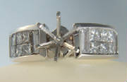 #RG0369 18 karat white .37Cts.TW semi mount. Finger size 6.25. Web priced $3,082.53. Center stone of your choice is extra.